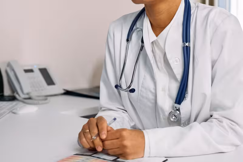 Book Your Microsuction Ear Wax Removal Appointment Today, And Say Goodbye to the Discomfort of Ear Wax.: A doctor in a clinic Doctor in clinic for Book Your Microsuction Ear Wax Removal Appointment Today, And Say Goodbye to the Discomfort of Ear Wax...